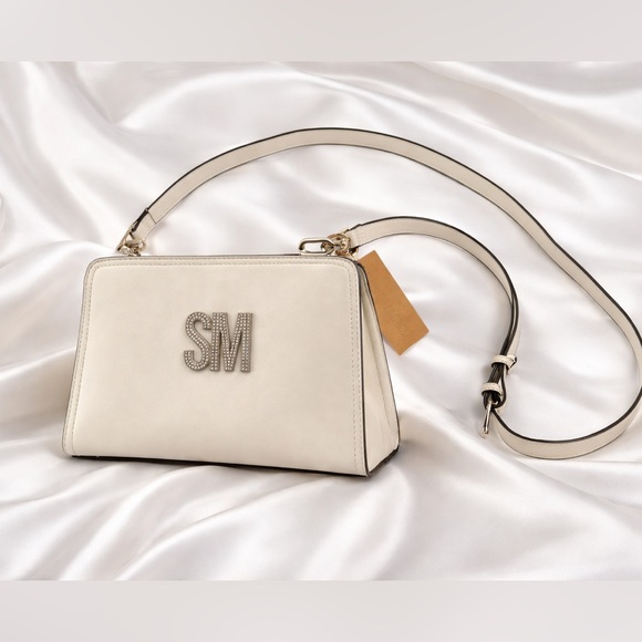 Steve Madden Handbags - NWT Steve Madden Cream Crossbody Bag with SM Logo